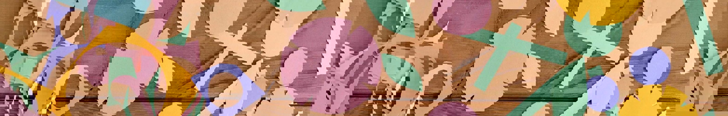 Paper shapes scattered on a desk