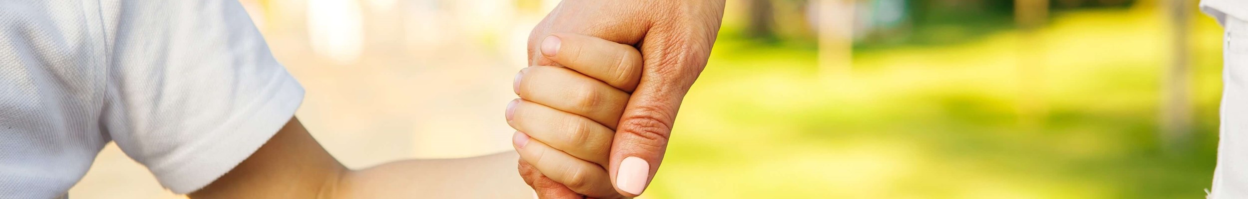 Parent and child holding hands