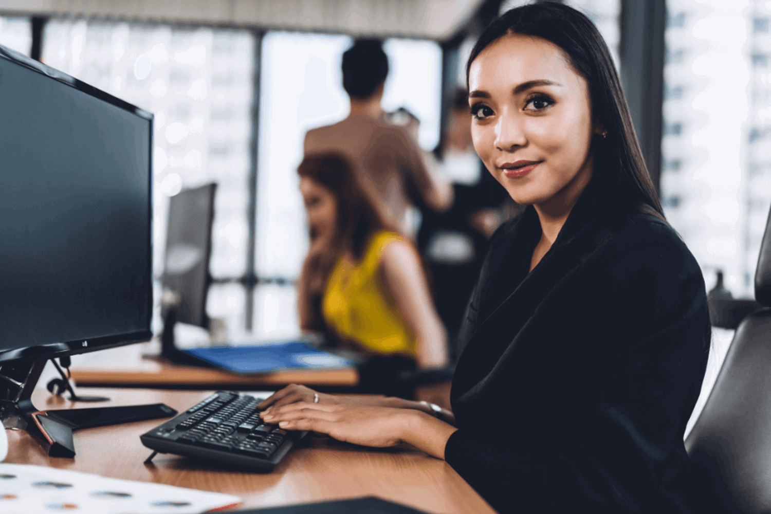 Smiling girl in office